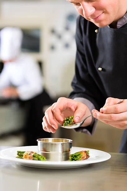 istock Chef in hotel or restaurant kitchen cooking 471436213