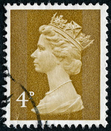 Gomel, Belarus - March 24, 2013: Postage stamp. A stamp printed in UK shows image of Elizabeth II is the constitutional monarch of 16 sovereign states known as the Commonwealth realms, in green, circa 1988.
