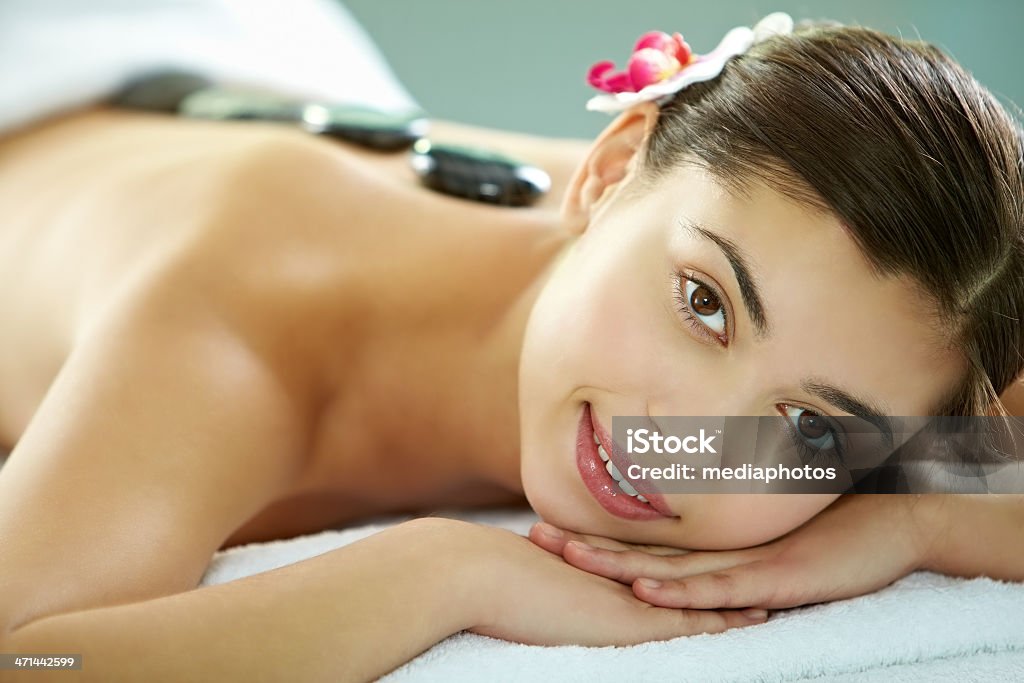 Calmness and comfort Young woman visiting spa salon 20-24 Years Stock Photo