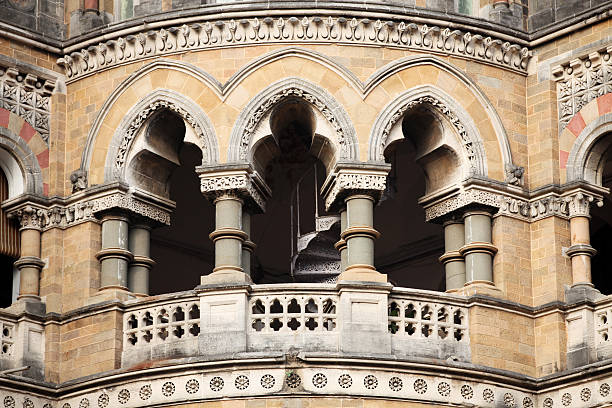 Beautiful curved window, Heritage Trail colonial architecture, Amritsar city, Punjab, India. Amritsar is a city rich in Sikh heritage and history being a major pilgrimage centre, especially for the Golden Temple, but also for Partition in 1947. The Heritage Walk explores its traditional architecture, historic lanes, Katras, Akharas, Bungas, Havelis, and Hattis. The Punjab, is the state which is the heart of India’s Sikh community, bordering Pakistan. The city of Amritsar is best known for Harmandir Sahib, the holiest gurdwara, or Sikh place of worship and a major pilgrimage site. The distinctive Golden Temple, as it is known in English, is surrounded by the Pool of Nectar.