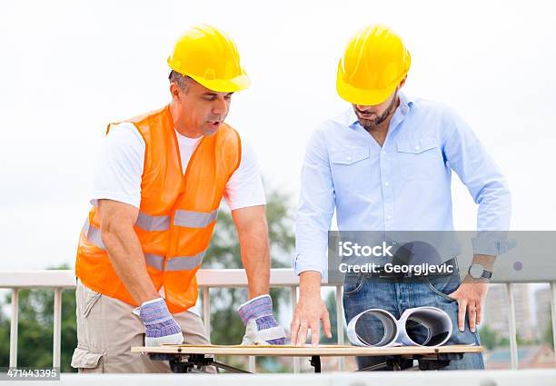 Construction Workers Stock Photo - Download Image Now - Civil Engineer, Adult, Adults Only