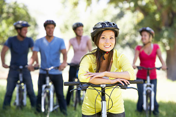 istock Group Of Young Friends On Cycle Ride In Countryside 471443521