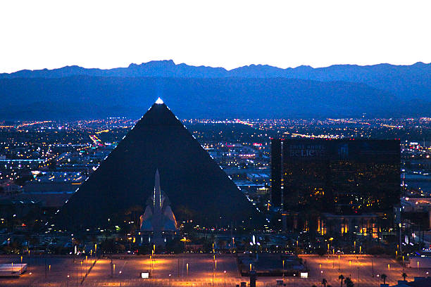 Aerial Shot of the Luxor Hotel and Casino Sunset Las Vegas, Nevada, United States - May 15, 2012. Aerial shot of the Luxor hotel and casino on the Las Vegas Strip at sunset. The Las Vegas Strip is home to most of the world's largest hotels and casinos. luxor las vegas stock pictures, royalty-free photos & images