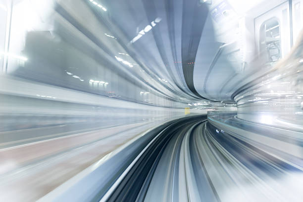 túnel de metrô com motion blur de uma cidade do interior - train blurred motion nobody subway train - fotografias e filmes do acervo