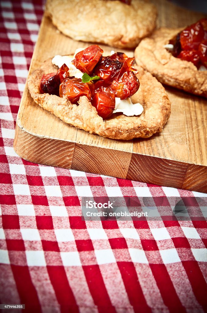 Cherry Tomatoe Tartellete Royalty free stock photo of tartelette made up of dried tomatoes and goat's cheese. Appetizer Stock Photo