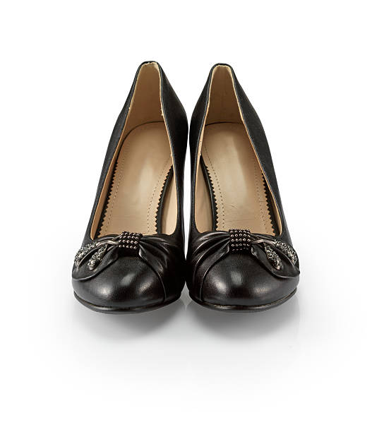 istock Black female shoes on a white background 471446621