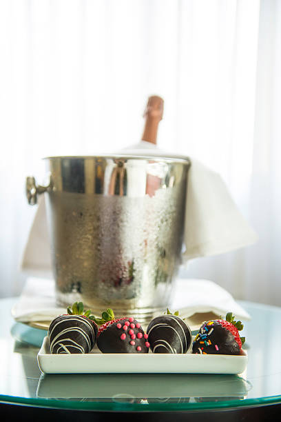 Champagne and Strawberries champagne, strawberries / which are dipped in choc-o-late / a lovely surprise chocolate covered strawberries stock pictures, royalty-free photos & images