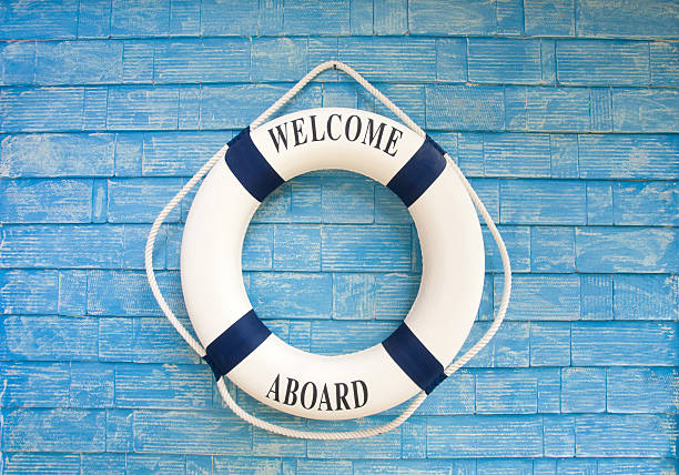 istock Life buoy with welcome aboard on it 471448429