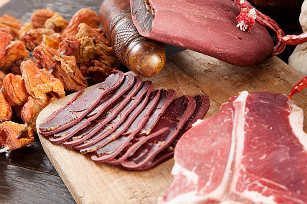 istock Raw fillet steak and bacon slices 471449353