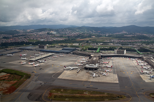 Gatwick, England - October 24th 2023: View to the main terminal building in Gatwick Airport from an approaching plane