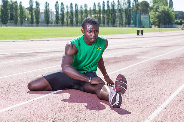 istock Track and Field Athlete Stretching 471451091