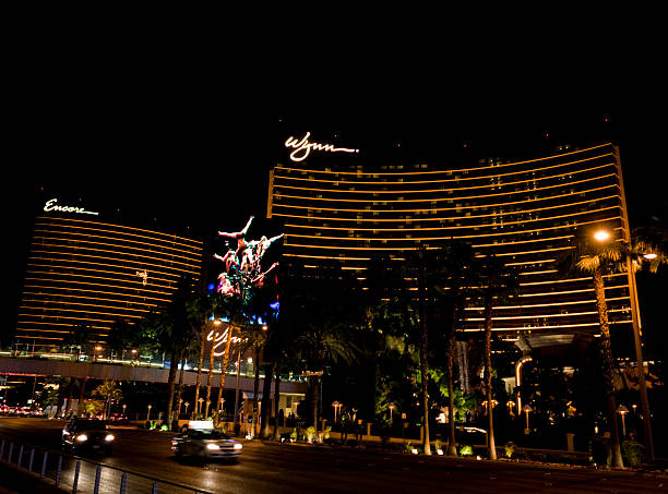 Wynn/Encore Hotel and Casino Nighttime Las Vegas, Nevada, United States - May 14, 2012. The Wynn and Encore hotel and casino on the Las Vegas Strip. The Las Vegas strip is home to most of the world's largest hotels and casinos. wynn las vegas stock pictures, royalty-free photos & images