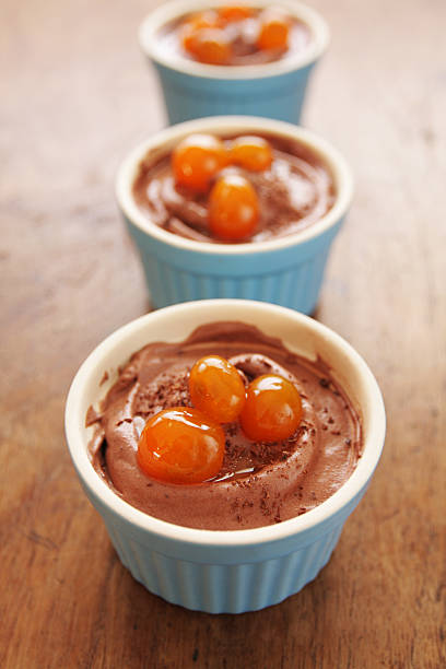 Chocolate mousse with kumquat in syrup dessert