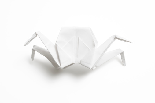 High angle view of blank origami crab isolated on white background with clipping path.