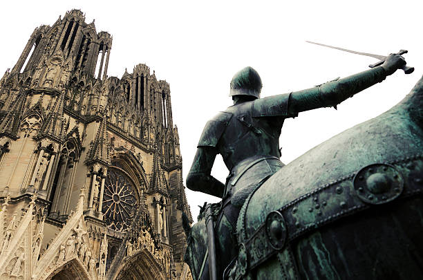 St. Joan Of Arc St. Joan Of Arc statue at Cathedral Notre-Dame in Reims, France. notre dame de strasbourg stock pictures, royalty-free photos & images