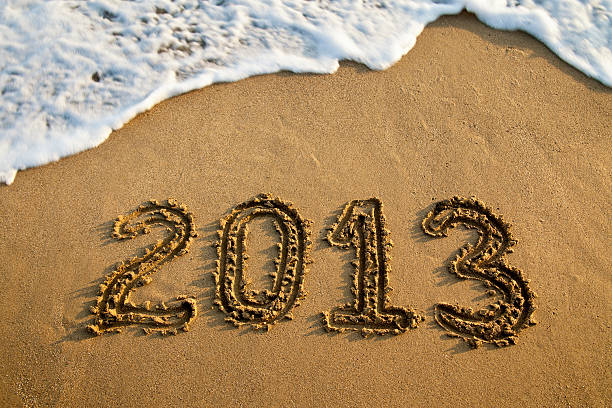 novo ano 2013 - 2013 beach sand new years day imagens e fotografias de stock