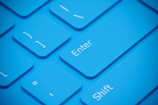 clavier bleu gros plan - enter key photos et images de collection