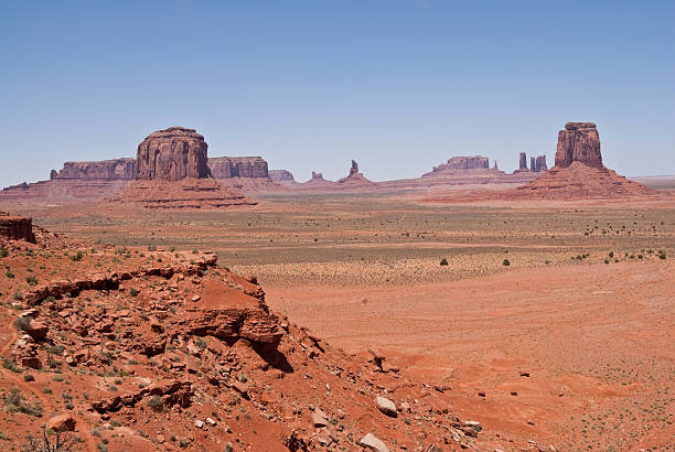 Monument Valley from North Window Overlook The American Southwest has some amazing landscapes, especially the colorful rock formations. The background of blue sky adds color, depth and contrast to the scene. This view of rock formations is in Monument Valley Tribal Park in Arizona, USA. kayenta photos stock pictures, royalty-free photos & images