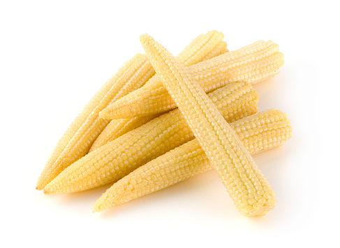 Heap of Baby Corn on a white background.
