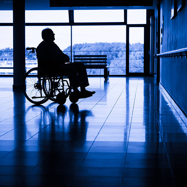 istock Senior man on a wheelchair 471455457