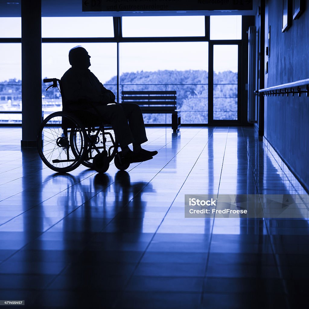 Senior man on a wheelchair Senior man sitting on a wheelchair Depression - Sadness Stock Photo