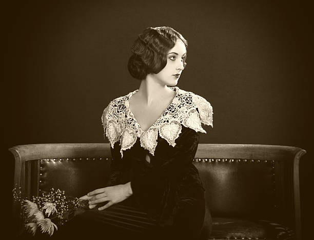 1920s style.Female portrait Emulation of vintage style photography. Contain grain for more vintsge effect.Sepia toned actress photos stock pictures, royalty-free photos & images