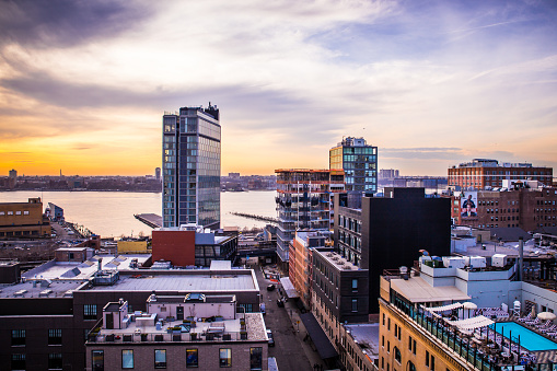 New York City, New York, USA - April 6, 2015:  View across Manhattan Meatpacking District from above, at sunset with The Standard Hotel in view.  This gentrified neighborhood is well known for its restaurants, hotels and access to the High Line Park.