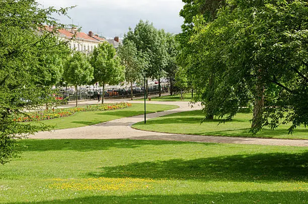 Park with green grass and tree in Nancy, Lorraine, France.