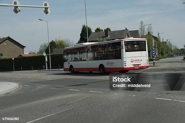 Bus Is Crossing The Street Stock Photo - Download Image Now - 2015, Bus, Bus Stop