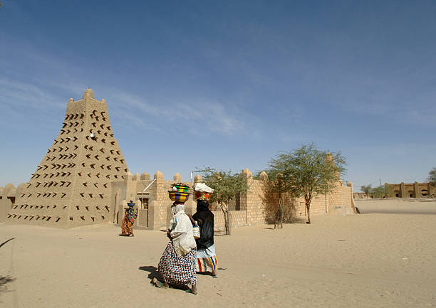 Timbuktu Mosque A typical scene in the legendary desert city of Timbuktu. mali stock pictures, royalty-free photos & images