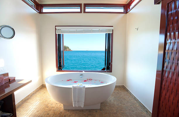 istock Luxury bathroom at over water resort 471456387