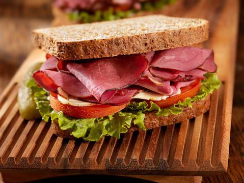 Smoked Meat Sandwich with Lettuce, Tomato and Cheese on Whole Wheat Bread-Photographed on Hasselblad H3D2-39mb Camera