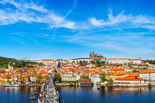 Charles bridge and Prague castle from Old town Prague: Mala Strana,  Charles bridge and Prague castle view from Old Town bridge tower over Vltava river in daytime. Prague, Czech Republic old town bridge tower stock pictures, royalty-free photos & images