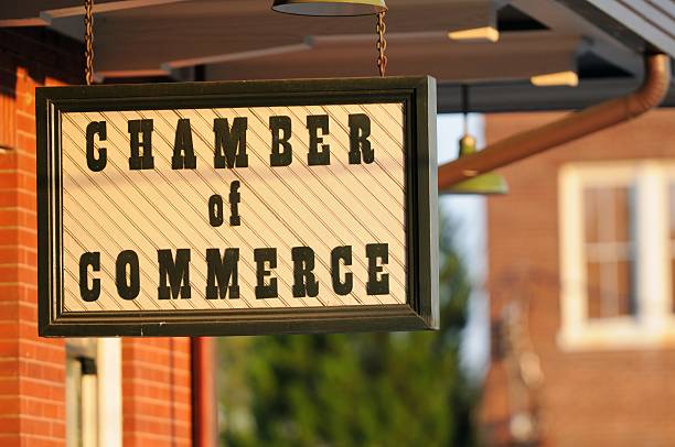 Hanging chamber of commerce sign stock photo