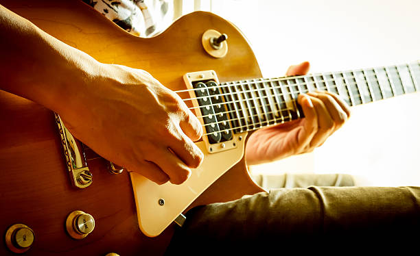 istock A man playing an electric guitar 471461793