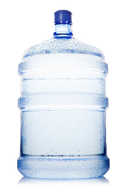 istock gallon pastic water bottles on whıte background 471462143