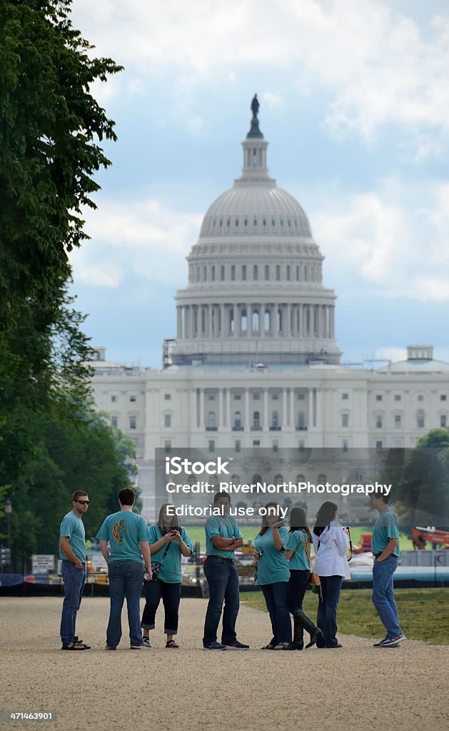 Washington DC Capitol Washington DC, USA - June 5, 2012: A group of young people stand at the National Mall with US Capitol building in the background. Washington DC Stock Photo