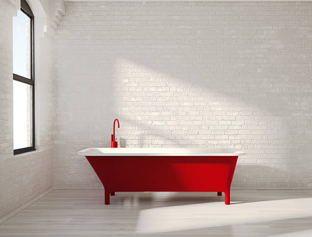 istock Contemporary red bathtub in a white interior 471464298