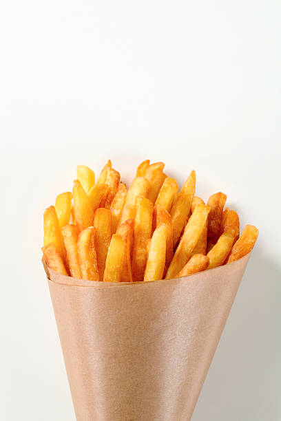 istock French fries in a paper cone 471467119