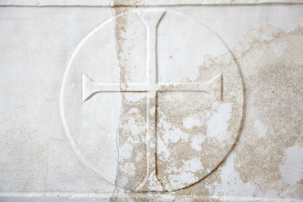 istock Cross carved in white marble, faith 471469481