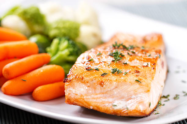 istock Fillet of salmon with mixed vegetables 471470097