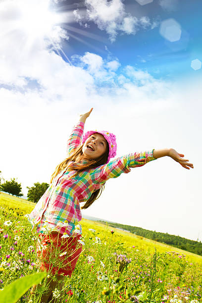 Happy girl in the middle of nature stock photo