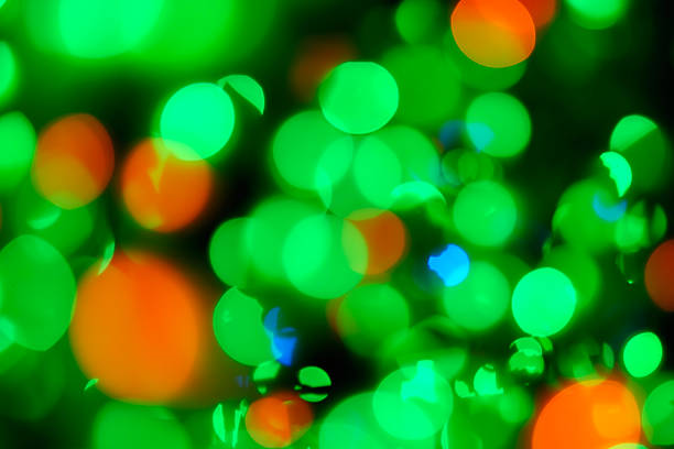 istock Green And Orange Christmas Abstract Background With Defocused Bokeh Lights 471470928
