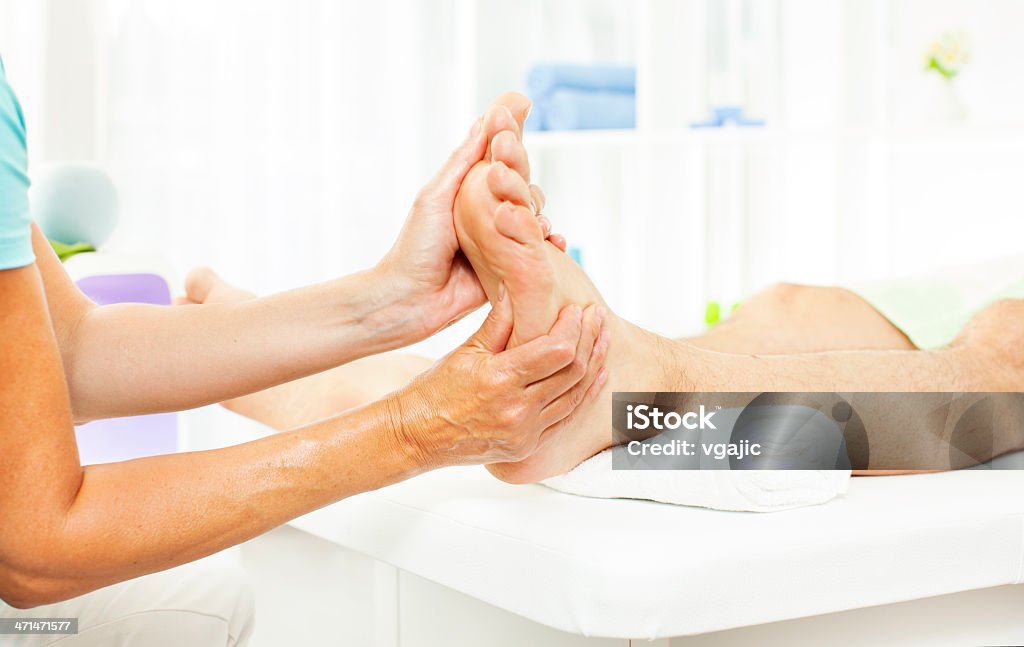Foot Massage - Lizenzfrei Alternative Behandlungsmethode Stock-Foto