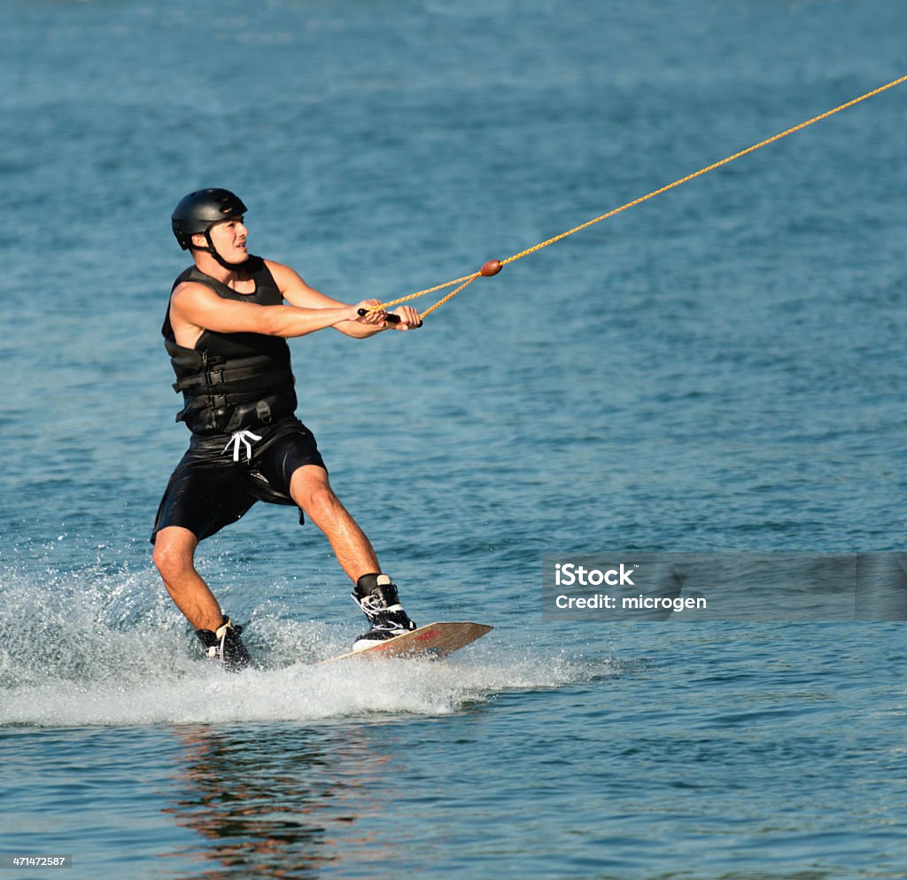 Sportsman wakeboarding Waterskiing Stock Photo