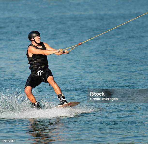 Sportsman Wakeboarding Stock Photo - Download Image Now - Waterskiing, Adult, Adults Only