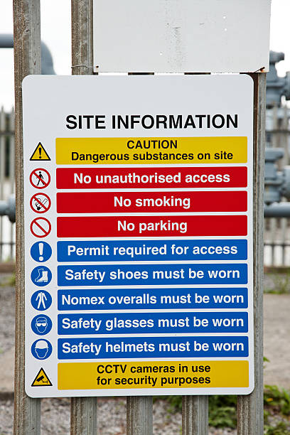 istock Safety notice on chemical works site 471473163