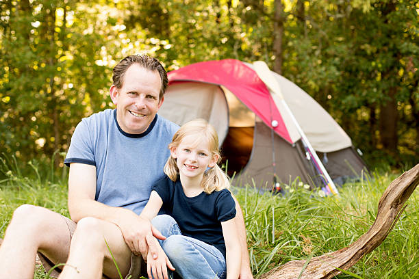 istock Father and Daughter Camping with Tent 471473893