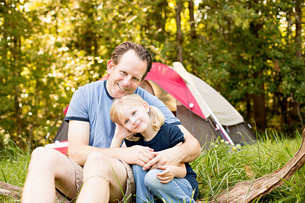 istock Father and Daughter Camping - Hugging 471473899