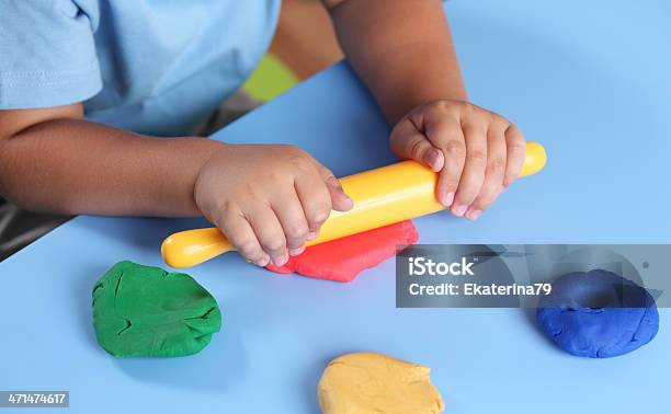 Child Playing With Modeling Clay Stock Photo - Download Image Now - Child's Play Clay, Child, Toddler